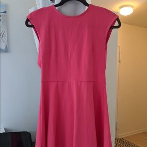 Pink Jersey stretchy a-line fit and flare dress with bow open back cutout